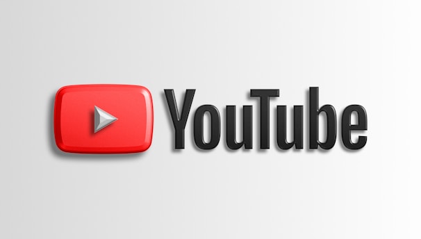 A prominent YouTube logo with a red play button icon on the left and the word 'YouTube' in bold black letters on the right, set against a light gray background.